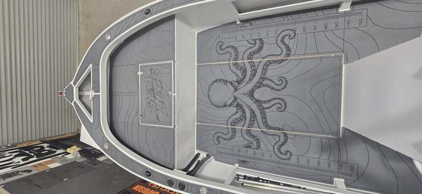 Same boat, bow to transom — one continuous design