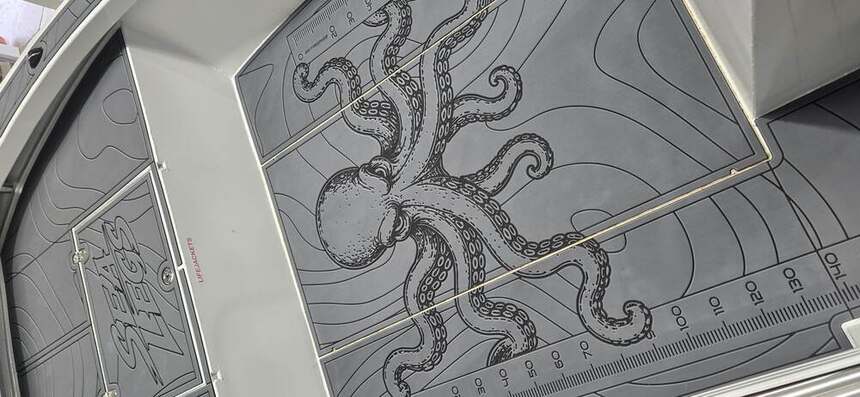 Octopus detail — routed line work, no printing
