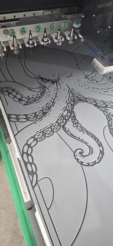 On the CNC bed — the octopus taking shape